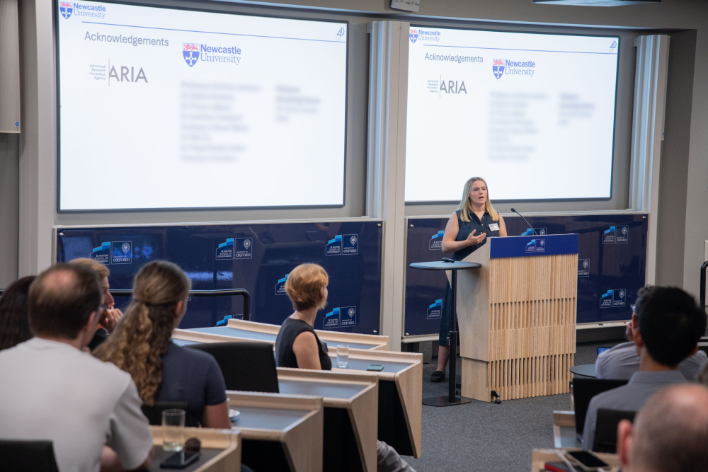 A researcher presents to the audience