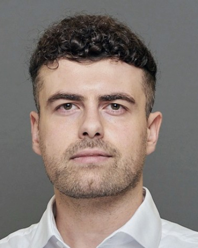 portrait photo of John Eraifej